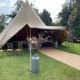 festival style wedding tent with bunting