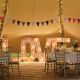 Large letters spelling love pictured in a wedding tent